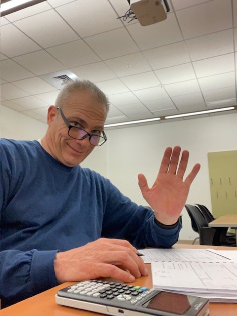 Kevin Mohan working on web development at CodeBreeze HQ